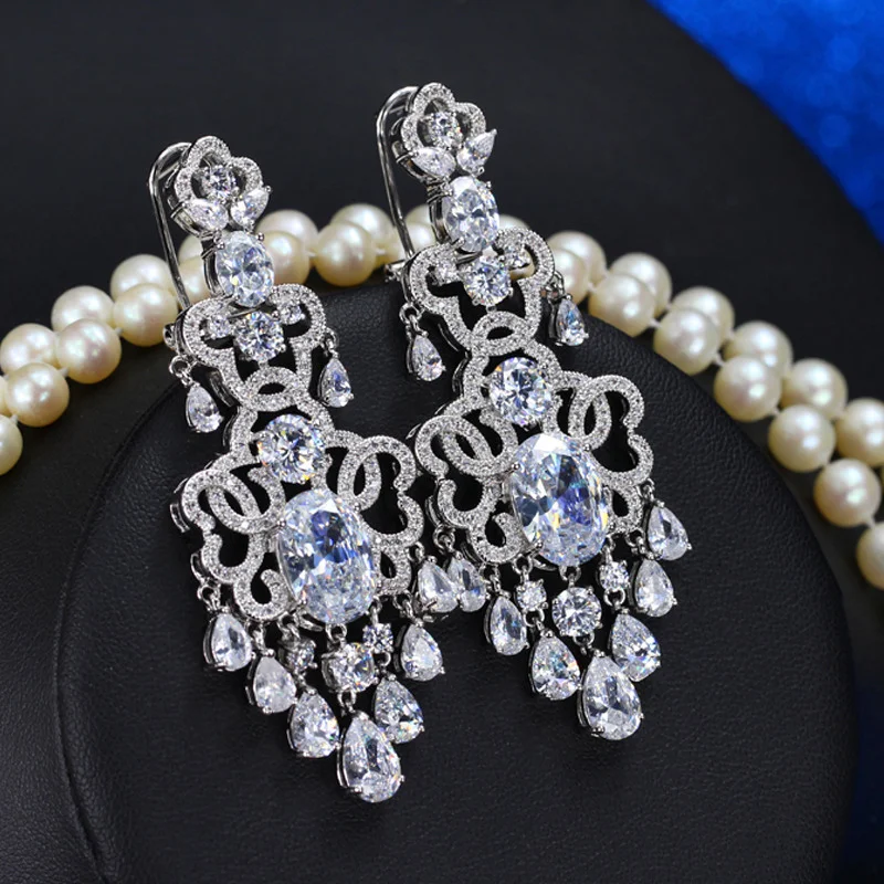 Boucles d'oreilles exagérées en zircon micro-serties pour femmes, subliment votre look avec élégance et un éclat incomparable.
