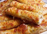 Easy Cheesy Breadsticks was pinched from <a href="http://www.food.com/recipe/easy-cheesy-breadsticks-149066" target="_blank">www.food.com.</a>