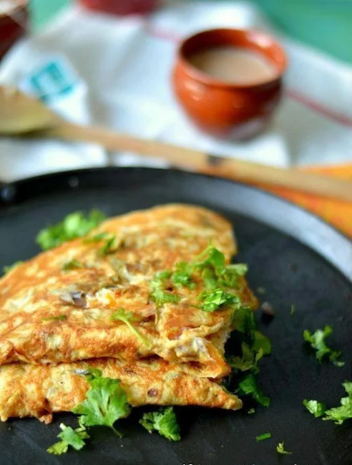 Masala Omelette (With 2 Slices Of Garlic Bread And Potato Wedges)