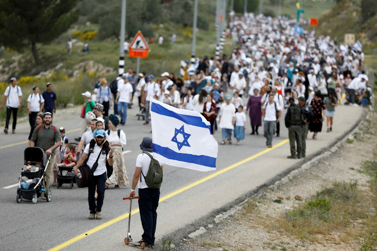 Israeli settlers hold a protest march from Tapuach Junction to the Israeli settler outpost of Evyatar, in the Israeli-occupied West Bank, April 10 2023. Picture: NIR ELIAS/REUTERS