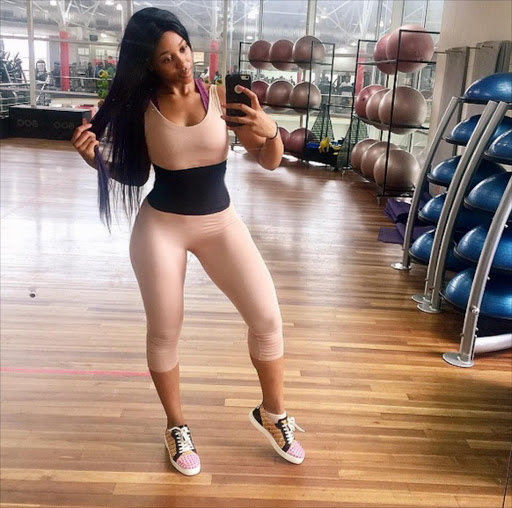 Sbahle Pisane works out in a gym which is something that needs discipline when working those New Year's resolutions. Picture credit: Instagram.