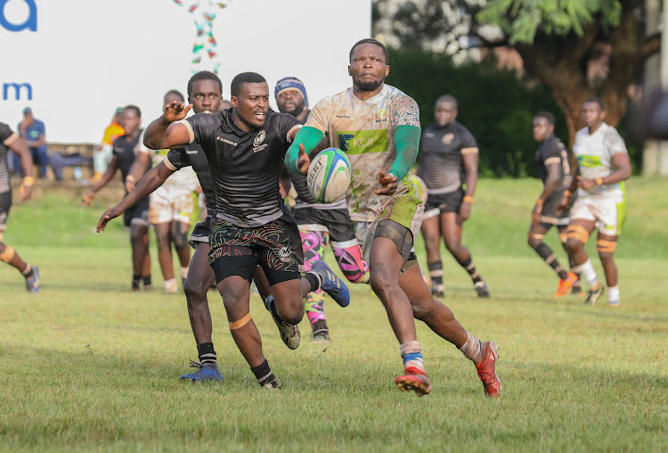 KCB utility back Darwin Mukidza passes the ball during a Kenya Cup match against Mwamba at the RFUEA grounds