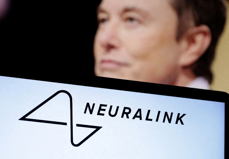 Neuralink logo and Elon Musk photo are seen in this illustration. Picture: REUTERS/DADO RUVIC