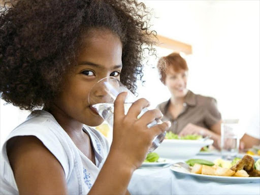 A girl drinking water