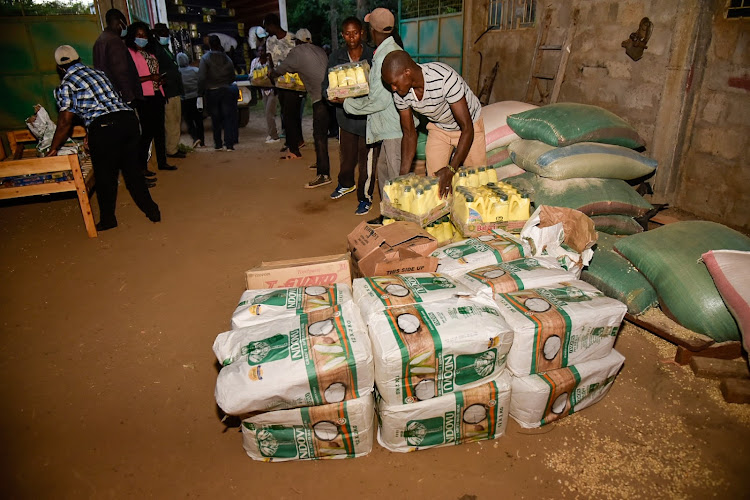 Residents of Ol Moran in Laikipia displaced by violence receive flour, oil and other food and non-food aid from Nakuru government on Tuesday, September 14.