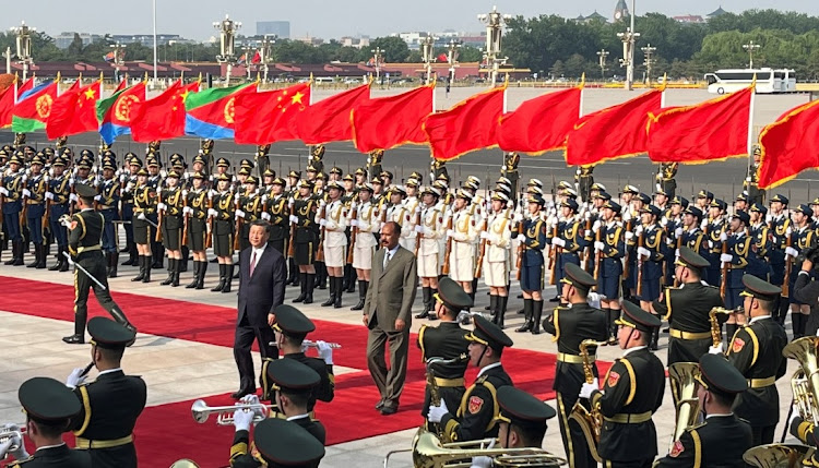 Chinese President Xi Jinping and Eritrean President Isaias Afwerki attend a welcoming ceremony outside the Great Hall of the People in Beijing, China, May 15 2023. Picture: JOE CASH/REUTERS