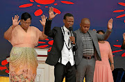 Mboro praying for rain with Minister Nomvula Mokonyane. /  TWITTER