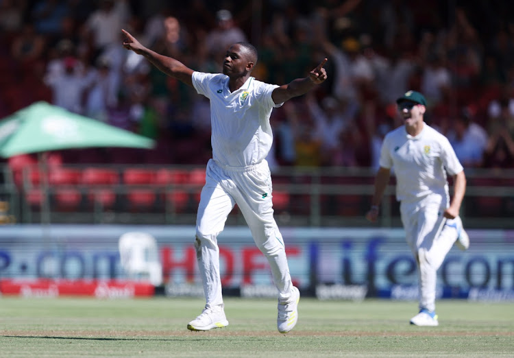 South Africa's Kagiso Rabada celebrates after taking the wicket of India's Virat Kohli, caught out by Aiden Markram on day one of the second Test at Newlands on Wednesday.