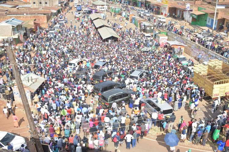 CCU Machakos governor candidate Nzioka Waita with Rose Wambua during their first political campaign at Mbondoni Catholic Church in Kangundo subcounty on Sunday, July 24.