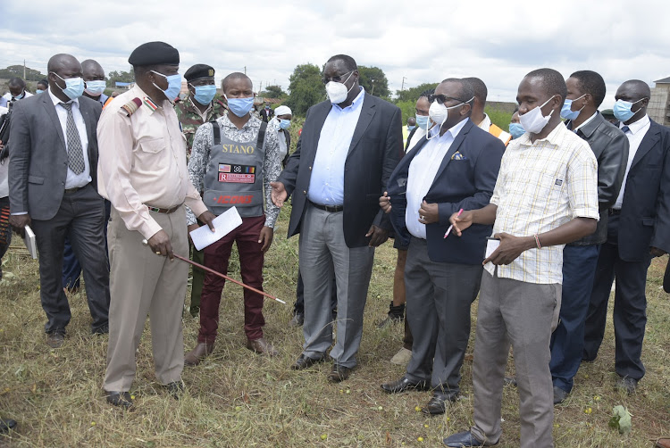 Kiambu county commissioner Wilson Wanyanga, Governor James Nyoro and Housing PS Charles Hinga during Kazi Mtaani project inspection in Kiandutu slums, Thika, on Wednesday, May 20, 2020