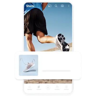 Приклад оголошення для створення попиту на мобільному пристрої, у якому показано кросівки в накладанні на коротке відео YouTube Shorts.