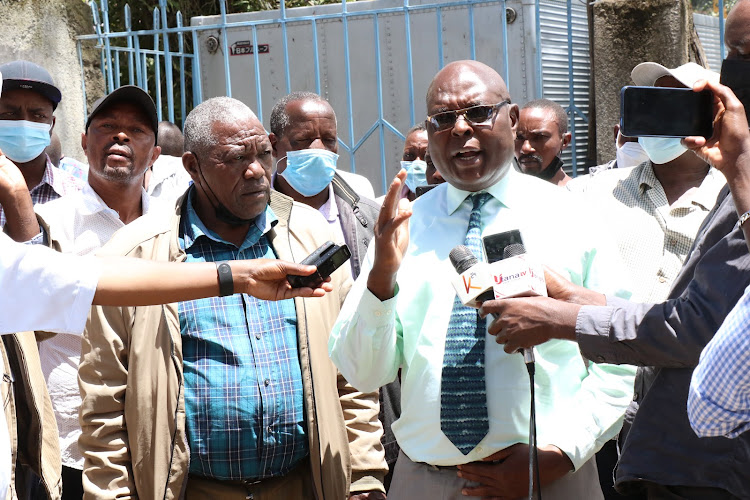 Nakuru County Matatus Association chairman, William Wafula (in spectacles) addresses the media during a press conference on October 28, 2021.