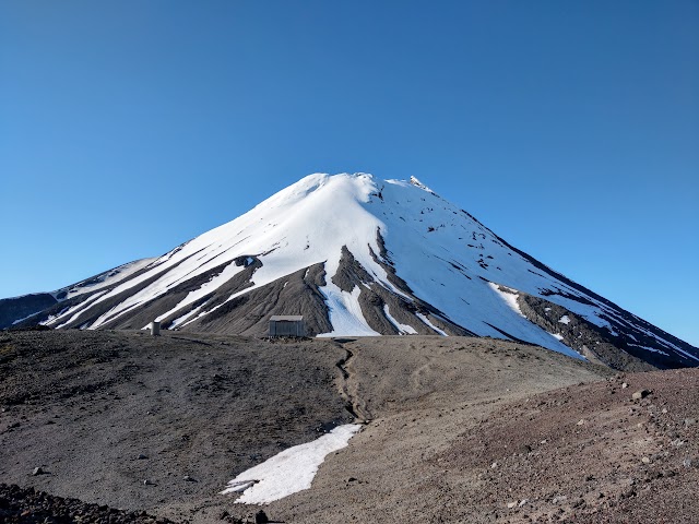 Syme Hut in the distance and Mt Taranaki backdrop