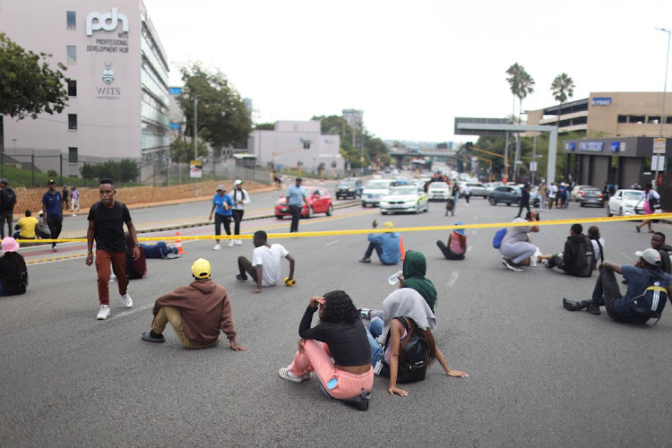 Protesting students block Empire Road, near the University of the Witwatersrand in Johannesburg on March 2 2023.