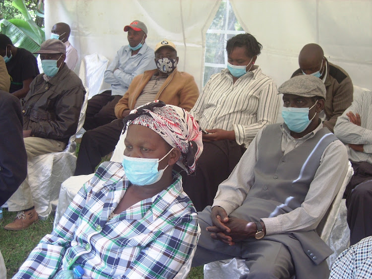 Members of Kireita CFA attend a meeting at Kireita forest in Kiambu county.