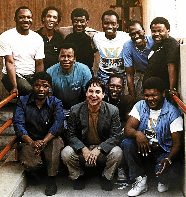 Paul Simon, front centre, and Joseph Shabalala, front left, with Ladysmith Black Mambazo. The US singer-songwriter and the Zulu a cappella group collaborated on the global hit album 'Graceland'.