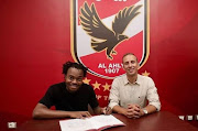 A leaked photo that has done the rounds on social media shows Percy Tau putting pen to paper for Egyptian giants Al Ahly. 