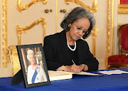 President of Ethiopia Sahle-Work Zewde signs a book of condolence at Lancaster House in London after the death of Queen Elizabeth II.