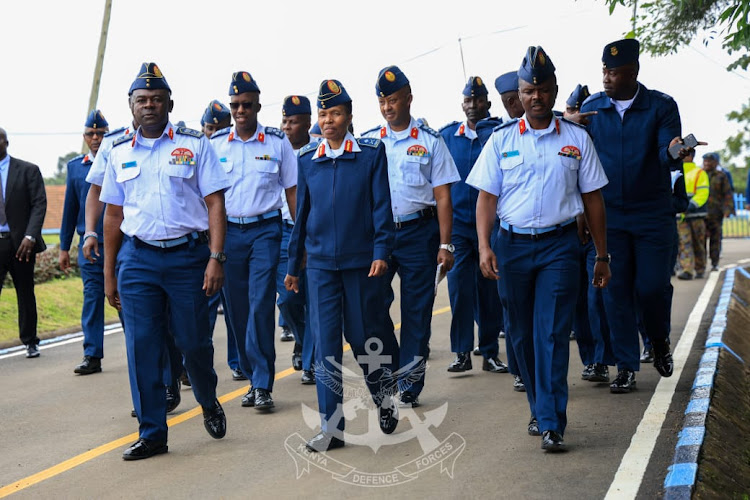 Major General Fatuma Ahmed and VCDF Lieutenant General John Omenda [L] together other service personnel take a walk during the change of guard ceremony at the KAF headquarters in Nairobi on May 9, 2024.