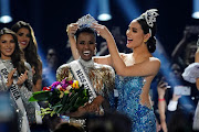 Zozibini Tunzi, of South Africa, is crowned Miss Universe by her predecessor, Catriona Gray of the Philippines, at the 2019 Miss Universe pageant at Tyler Perry Studios in Atlanta. 