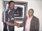 Buccaneer...Orlando Pirates new recruit Benson Mhlongo is welcomed by the club's chief executive officer Floyd 