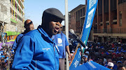 Solly Msimanga speaks to supporters at a rally in Johannesburg.