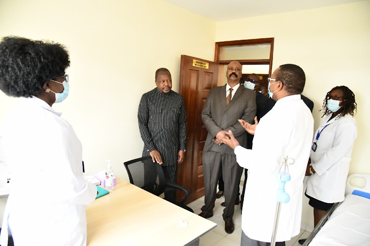 Outgoing Health CS Mutahi Kagwe and NMS director general Mohammed Badi during the commissioning of Ngara Otology Centre on July 20, 2022