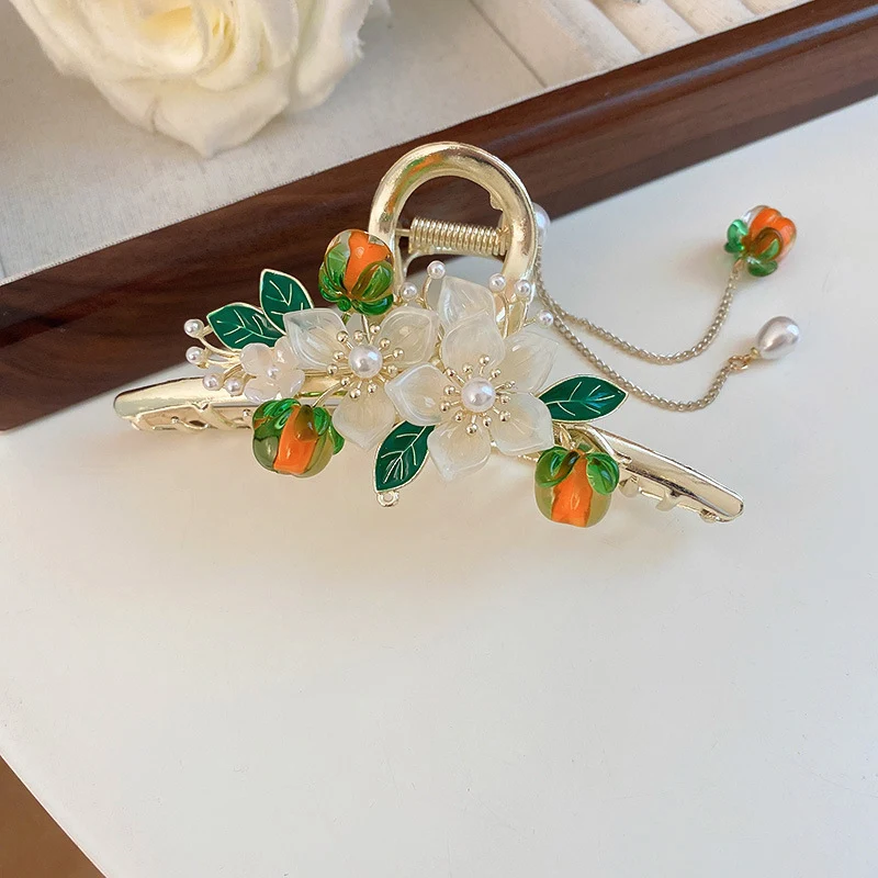 Title 5, Poignée à pompon fleur de kaki Guofeng Ruyi, po...