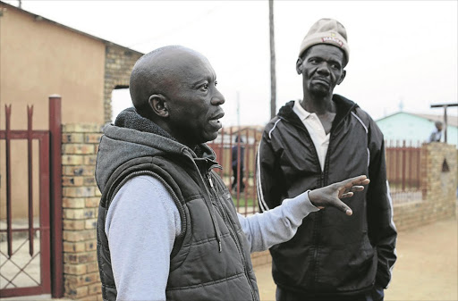 May 11, 2017. Reverend David Celo and Themba Njatjelo say poverty and poor servcice delivery exacerbate the tension in their town. Photo Tiro Ramatlhatse © Sowetan