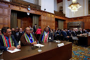 International relations and co-operation director-general Zane Dangor, minister Naledi Pandor and South African ambassador to the Netherlands Vusimuzi Madonsela at the ICJ on Friday. 