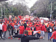 A sea of red as union members march in Pretoria. 