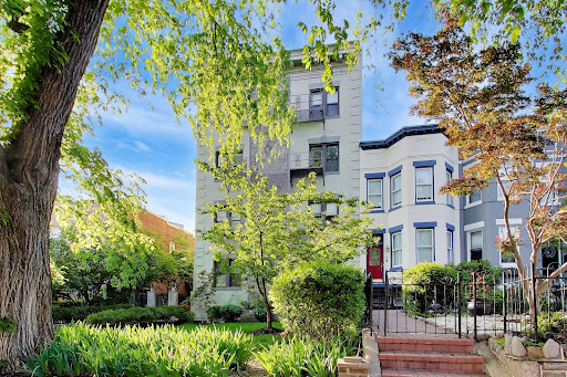 Building facade with green garden in this luxury property for sale in Washington ($385,000)