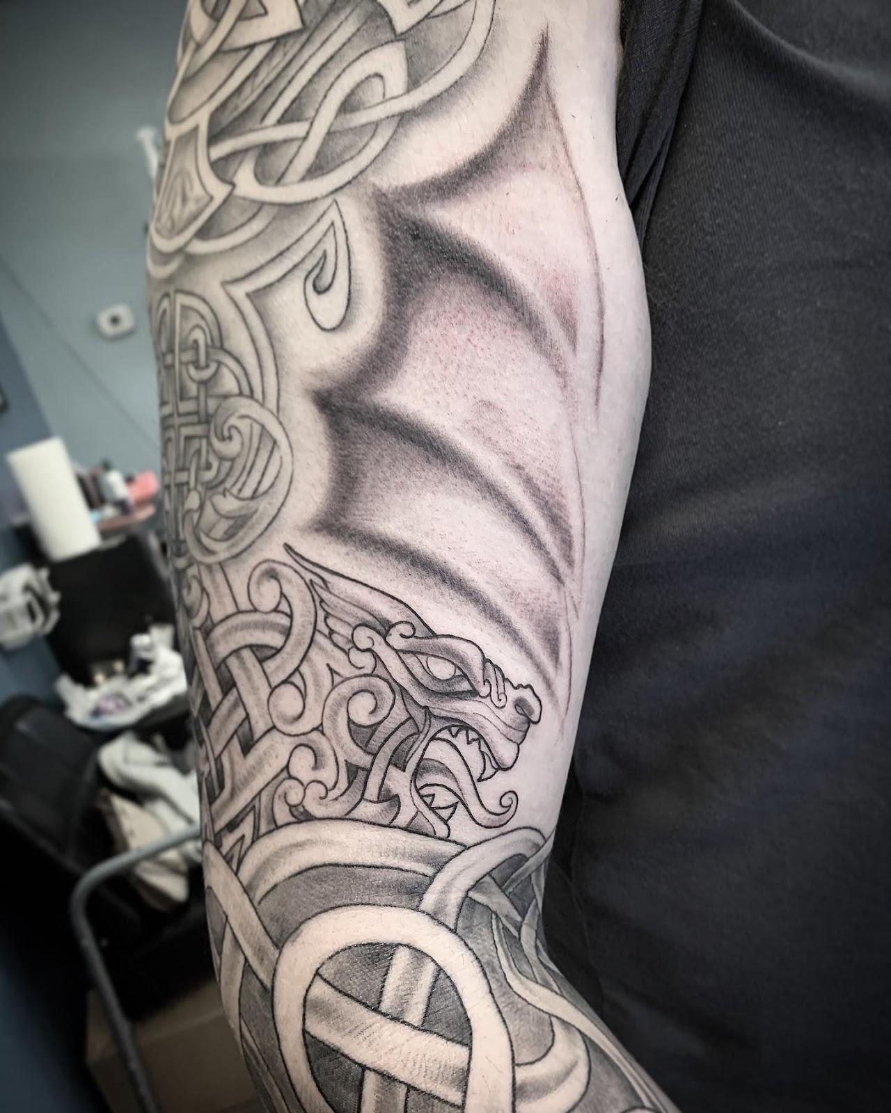 Celtic warriors sleeve tattoo