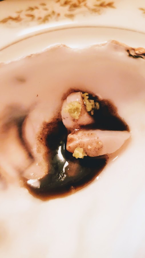 A Dinner at Erizo, pacific oyster and wasabi with toasted seaweed oil