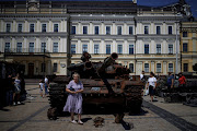 People visit an exhibition of destroyed Russian military vehicles and weapons, as Russia's attack on Ukraine continues, at Mykhailivska Square, in Kyiv, Ukraine, on July 23 2022. 