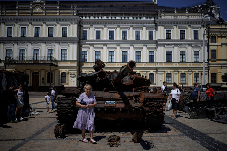 People visit an exhibition of destroyed Russian military vehicles and weapons, as Russia's attack on Ukraine continues, at Mykhailivska Square, in Kyiv, Ukraine, on July 23 2022.