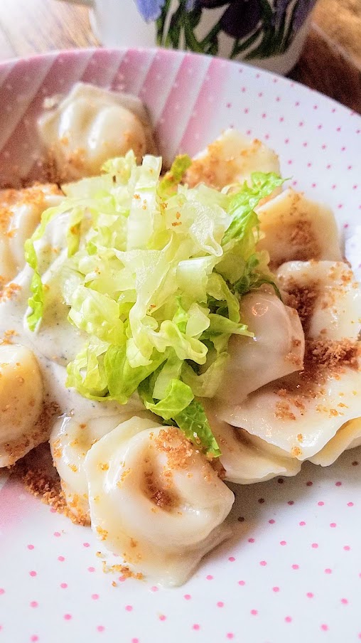 Portland Dumpling Week 2019 dish from Kachinka of Parmesan vareniki with Caesar smetana, shredded romaine and toasted breadcrumbs