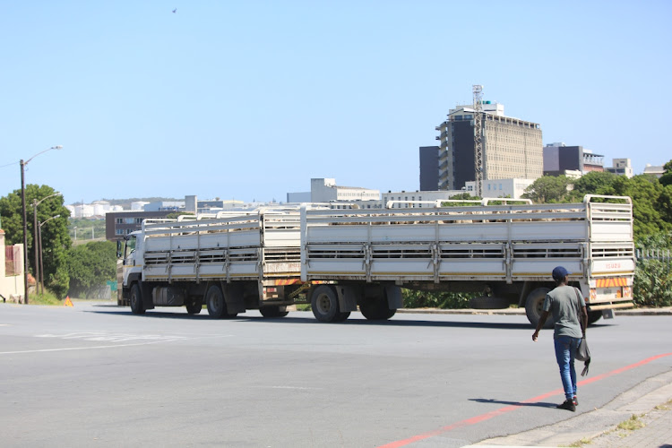 A truck carrying some of more than 60, 000 sheep to be loaded onto the Al Massilah.