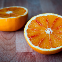 Yellow oranges cut in half