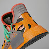 hu nmd animal print focus orange / core black / screaming green