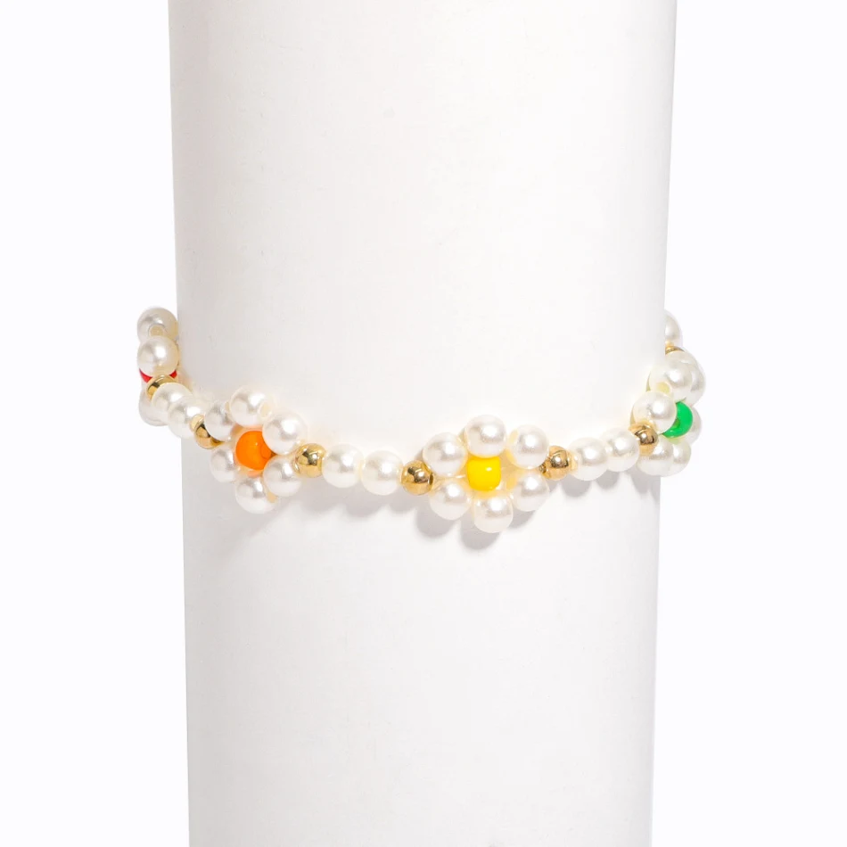 Collier et bracelet fleurs tissées de perles, un ensemble élégant et féminin, parfait pour rehausser votre style et ajouter une touche de lumière.