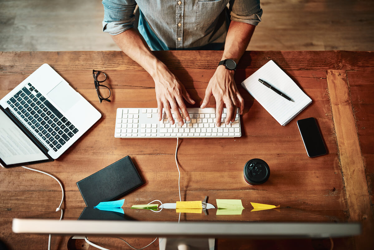 Workplace productivity: entrepreneur using a keyboard