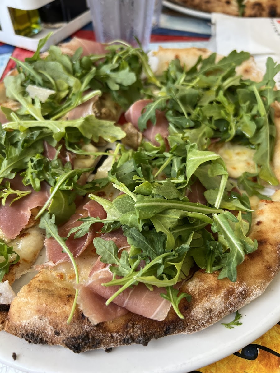 Gf pizza with arugula amd prosciutto