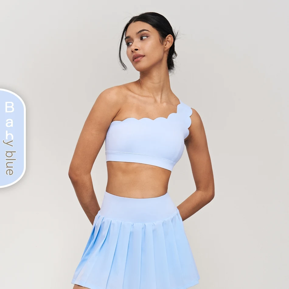 Soutien-gorge de sport LC Lycra avec bretelles épaules et bonnets amovibles. Sous-vêtements sportifs pour un maintien optimal et confort.