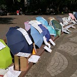 Sunday at People's Square, parents marrying out their children with Umbrellas in Shanghai, China 