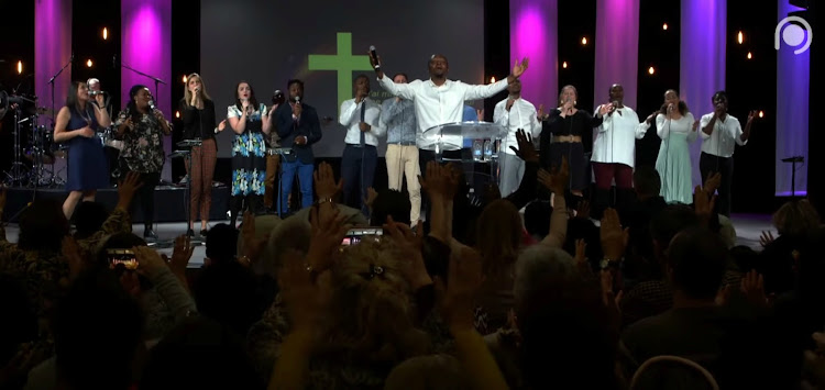 A gospel choir performs at the 2020 gathering of the Christian Open Door Church in Mulhouse, France, February 18, 2020 in this still image taking from a video. Christian Open Door Chuch/Handout via REUTERS.