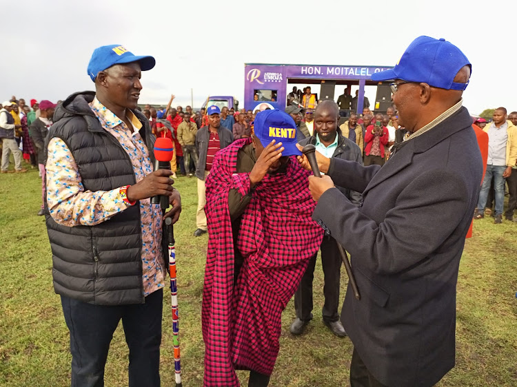 Narok North MP Moitalel ole Kenta receives a defector from Kenya Kwanza to Azimio la Umoja team in Talek, Narok West subcounty.