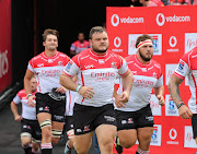 Dylan Smith of the Emirates Lions runs on to the field with his teammates ahead of a Super Rugby clash in March 2019. 