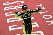 Ryan Blaneyv celebrates after winning the NASCAR Cup Series FireKeepers Casino 400 at Michigan International Speedway on August 22, 2021 in Brooklyn Michigan.