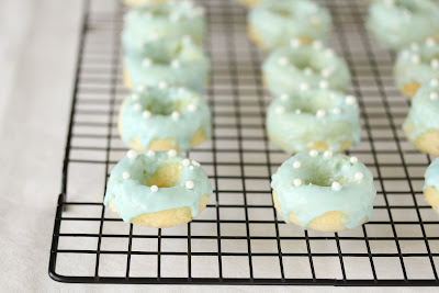 photo of mini donuts on a baking rack